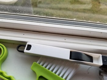 reviewer after image of the same window track now completely clean
