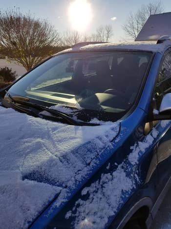 reviewer's clean, clear windshield after removing the snow cover