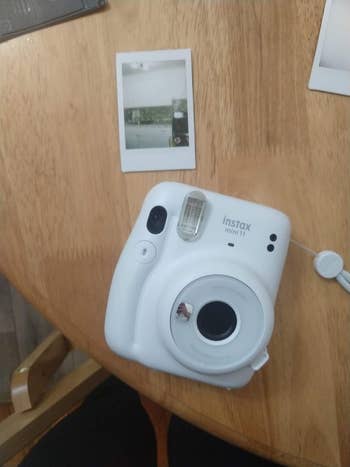 blue camera with picture taken 