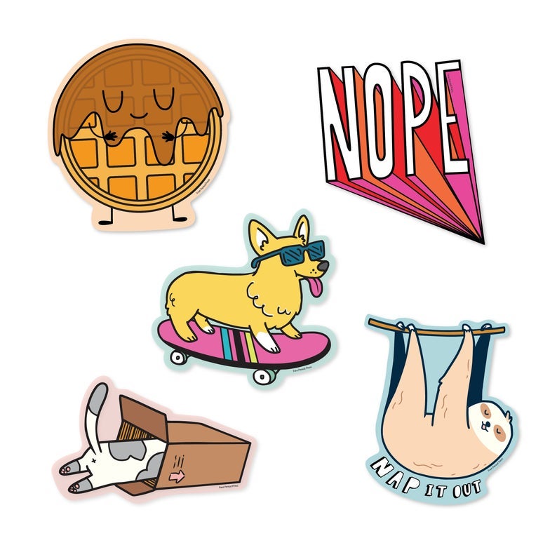 five stickers: a smiling waffle covered in syrup, a corgi wearing sunglasses on a skateboard, a cat butt sticking out of a box, block letters reading