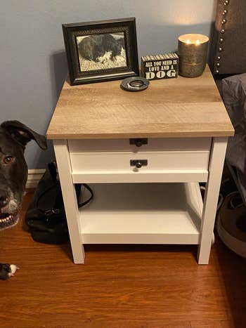 reviewer photo of farmhouse nightstand in a bedroom