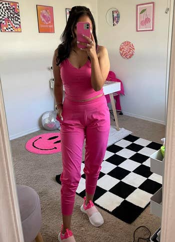 Reviewer in pink version of joggers 
