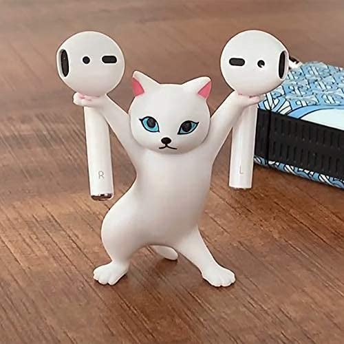 white cat figurine standing on hind legs and holding an airpod on each paw