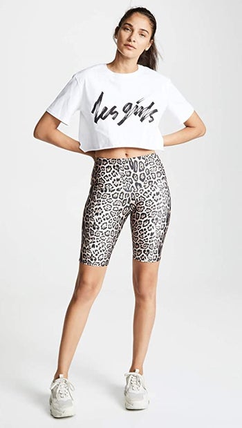 model wearing the bike shorts in leopard pring