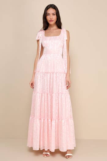 model in tiered pink maxi