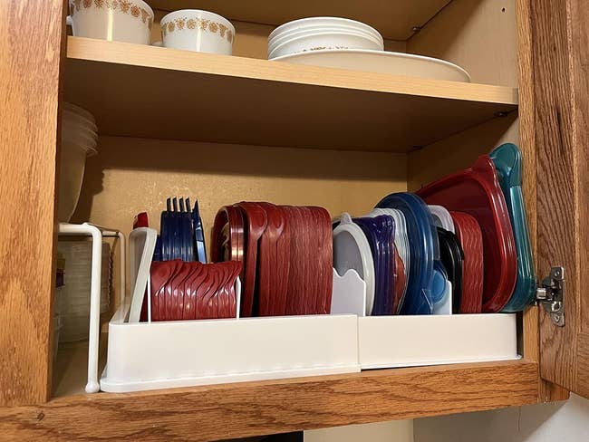 Reviewer's photo of the lid storage organizer in action