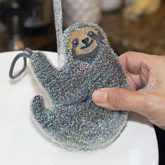 sloth shaped scrubber