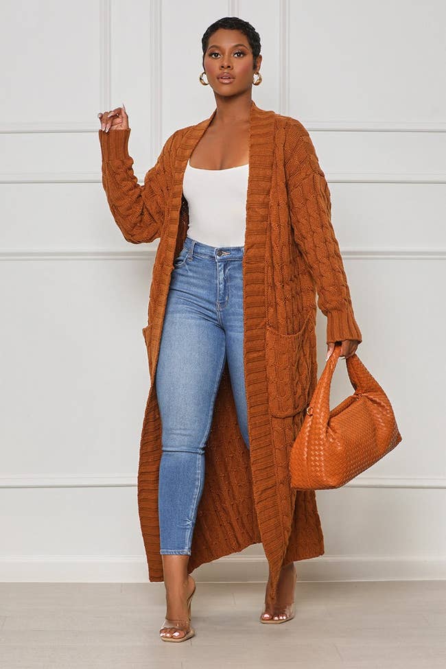 model wearing the brown long line chestnut cardigan with blue jeans