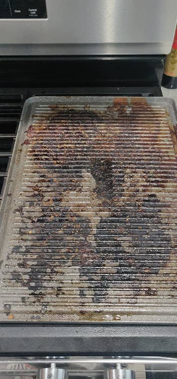 reviewer's grill with burnt on grease