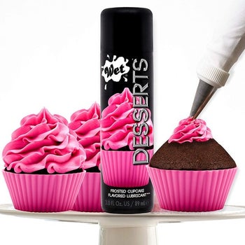Cupcake flavored lubricant surrounded by cupcakes on tray