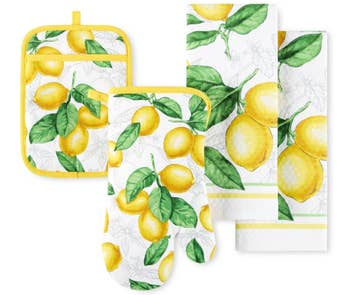 Lemon-themed room acceptable with oven mitt, cookware holder, and towels featuring caller citrus and leafage pattern, perfect for a vibrant room update