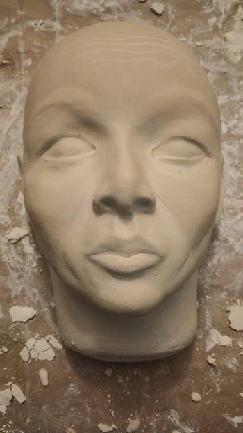 head sculpture made with the clay