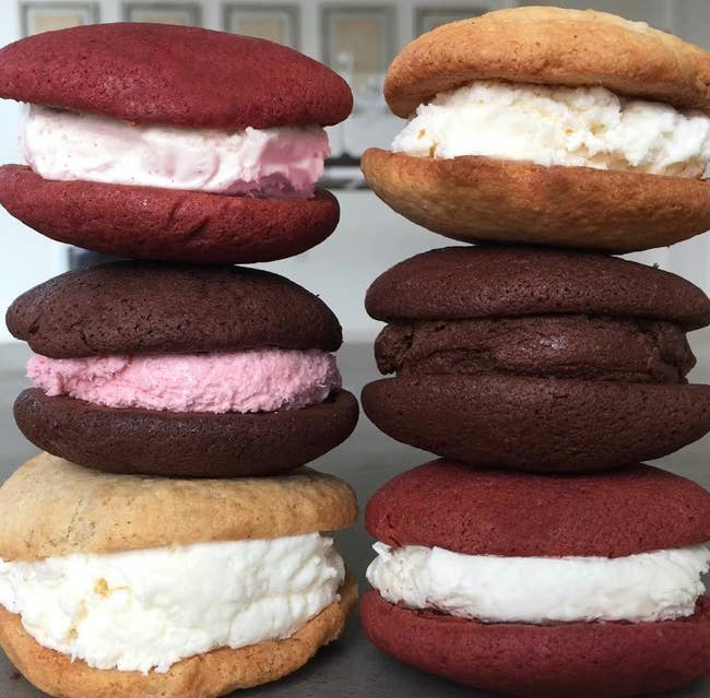 Six whoopie pastry sandwiches with assorted flavors stacked successful 2 columns