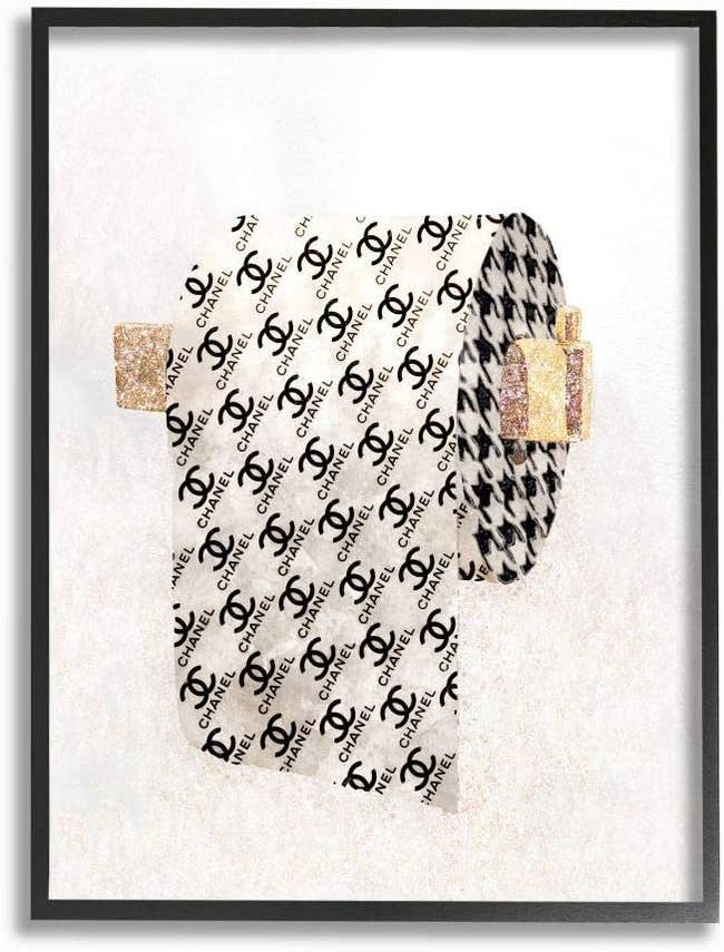 wall art that looks like Chanel logo print on a toilet paper roll