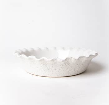 side view of the speckled white pie dish