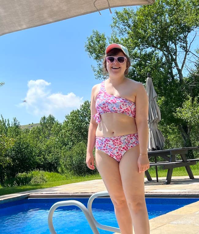 BuzzFeed editor wearing the high-waisted bikini in pink floral print