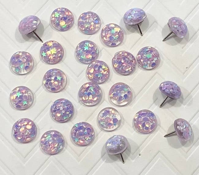 purple glittery push pins