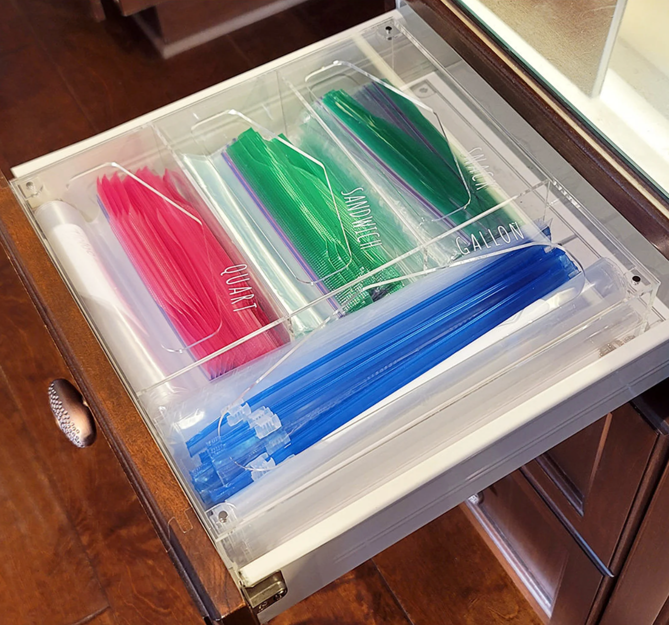 the acrylic bag organizer in a drawer