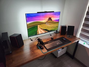 Reviewer's desktop computer is shown backlit