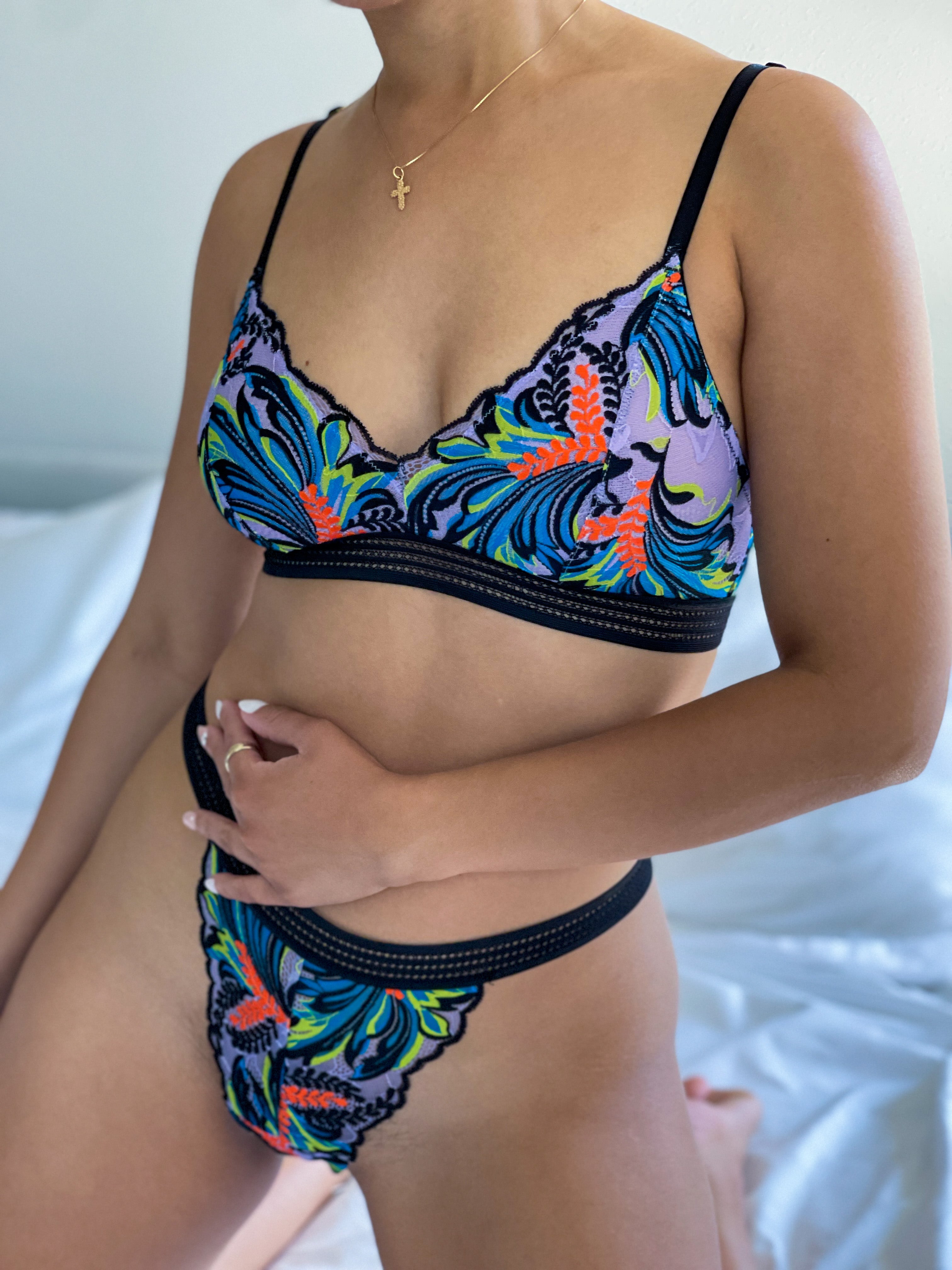 model wearing the multicolor tropical lace bralette and thong