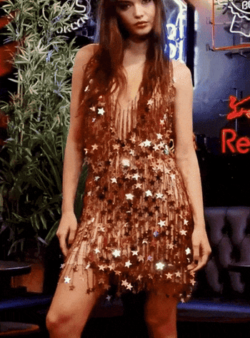 gif of model showing how the dress moves and reflects