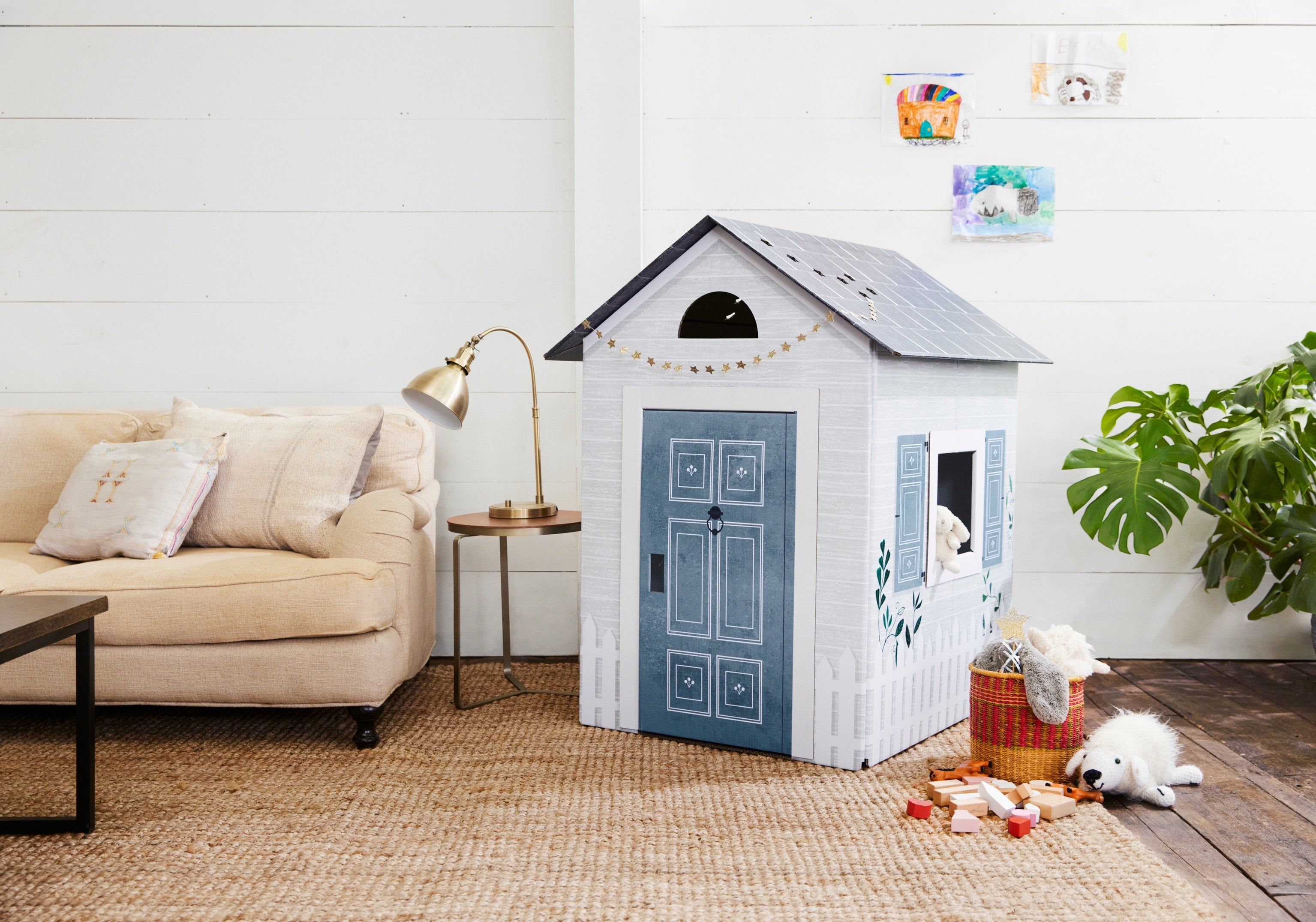 a cottage inspired cardboard playhouse