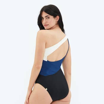the back view of a model wearing the bathing suit 