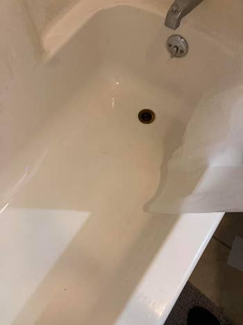 Close-up of the aforesaid bathtub present looking overmuch cleaner