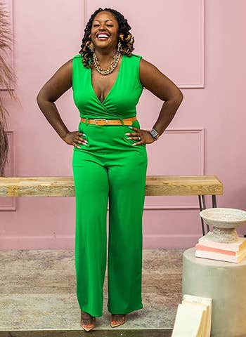 reviewer in the bright green jumpsuit