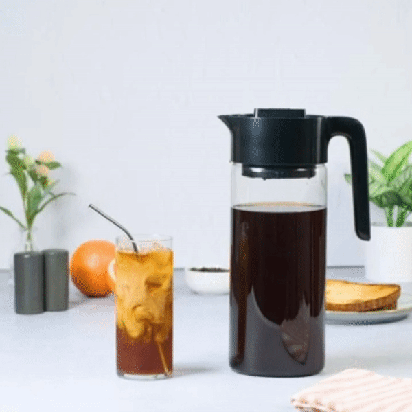 gif of the cold brew maker next to a glass of milky cold brew with text: cold. smooth. delicious.