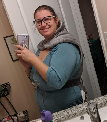 Image of reviewer wearing gray heating pad