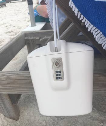 reviewer's white safe on a beach chair