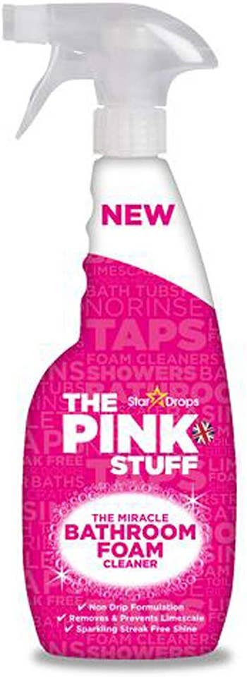 Pink spray bottle that reads 