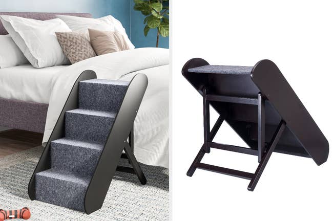Black wooden and gray carpeted four step dog stairs against bed on carpet, back view of product with wooden height adjusting legs