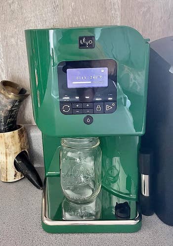 reviewer image of the green Levo machine