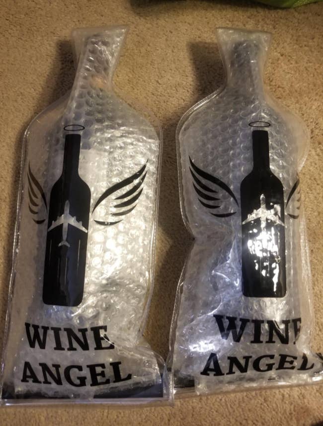 Two bottles of wine packed in wine-shaped plastic cushioned holders 