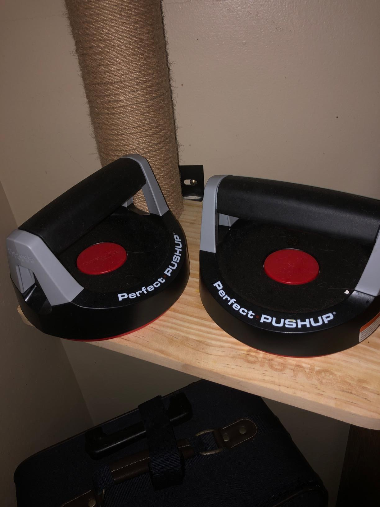 a reviewer photograph  of the pushup bars 