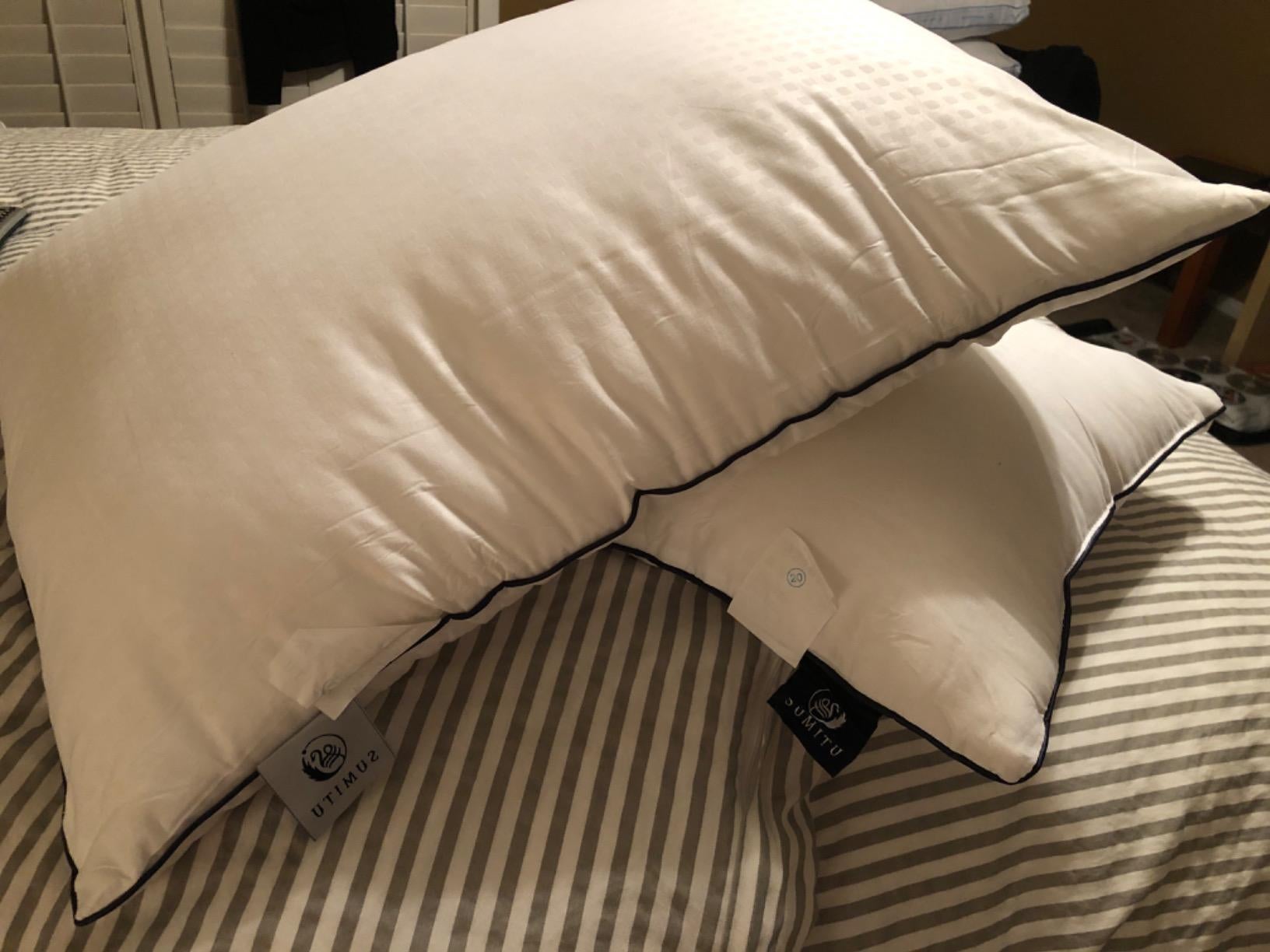 Two pillows on a bed