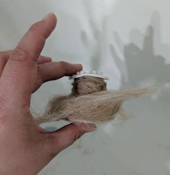 reviewer's tub shroom with long dog hair inside 
