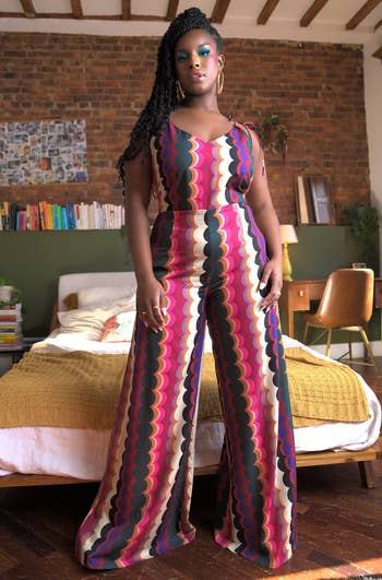 model in wide leg multicolor graphic print jumpsuit