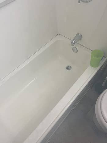 reviewer after image of the same bathtub now sparklingly clean