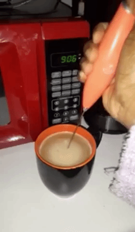 Video of reviewer using product in orange on coffee