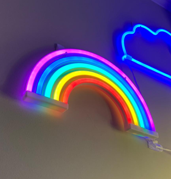 the rainbow light mounted on a wall