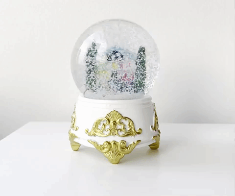 gif of a snowglobe of the lover house