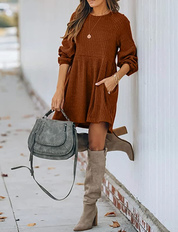 model wearing knit dress with boots in the color caramel
