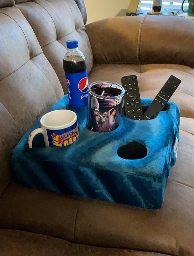 the cup cozy on a couch