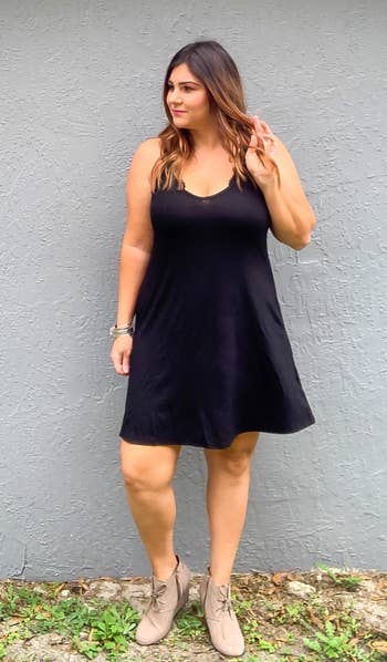 reviewer in black version of the dress 
