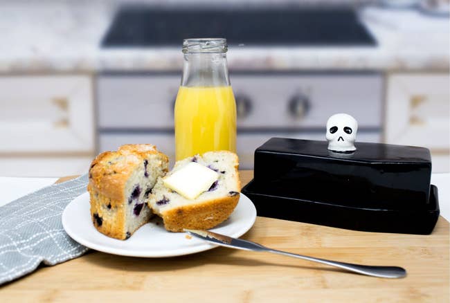 coffin-shaped butter dish with lid and skull handle 