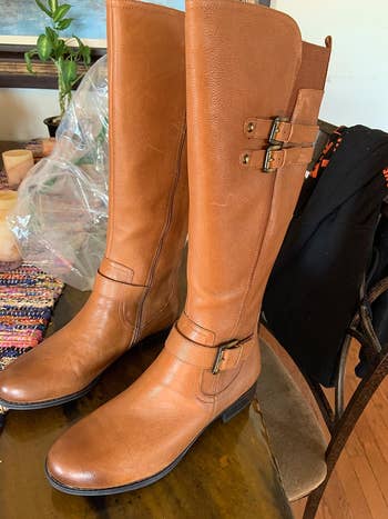 the riding boots in a light brown shade