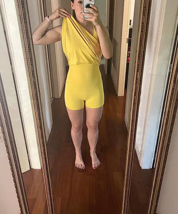 Reviewer wearing the yellow dress in size small